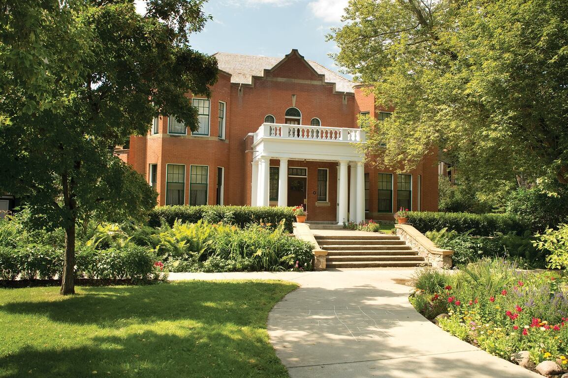 An example of a historic Edmonton house with traditional architectural features (James Rutherford House, an early 1900s brick Craftsman bungalow).